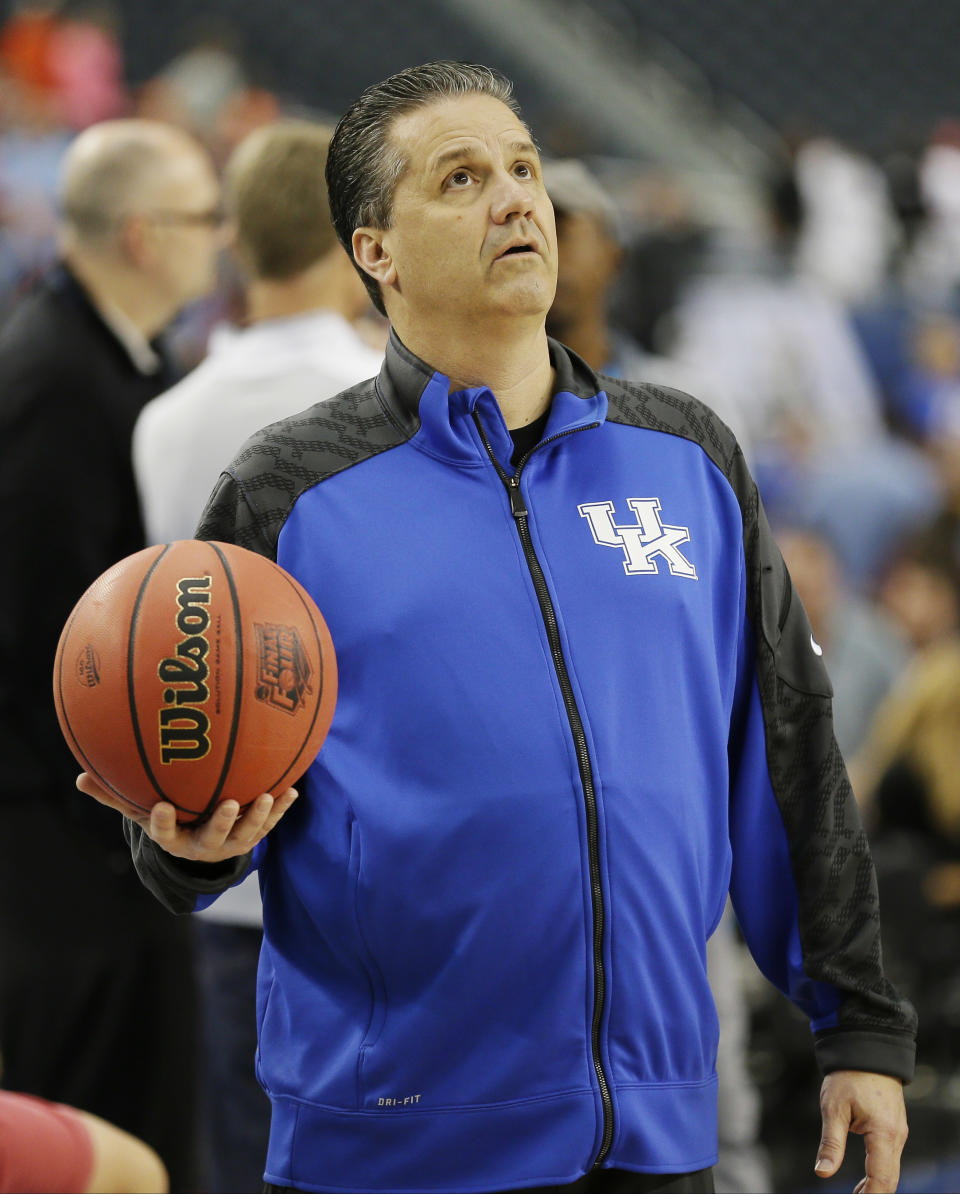 Kentucky head coach John Calipari watches his team during practice for their NCAA Final Four tournament college basketball semifinal game Friday, April 4, 2014, in Dallas. Kentucky plays Wisconsin on Saturday, April 5, 2014. (AP Photo/Charlie Neibergall)