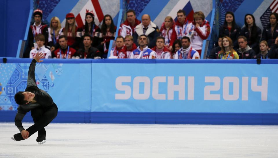 Patrick Chan of Canada competes during the Team Men Short Program at the Sochi 2014 Winter Olympics, February 6, 2014. REUTERS/Alexander Demianchuk (RUSSIA - Tags: SPORT FIGURE SKATING OLYMPICS TPX IMAGES OF THE DAY)