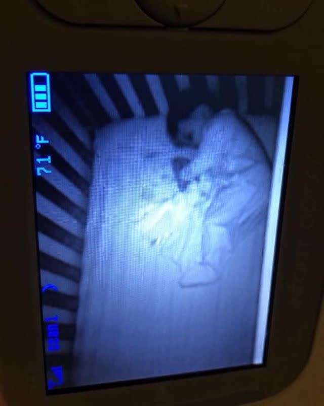 Maritza Cibuls, 32, from Illinois, spent a sleepless night convinced there was a ghost in her baby's cot with him before realising the next day her husband Corey (also pictured) had forgotten to put a mattress protector on the bed, meaning a sticker with a baby's face was showing through. Her Facebook post about the incident went viral.