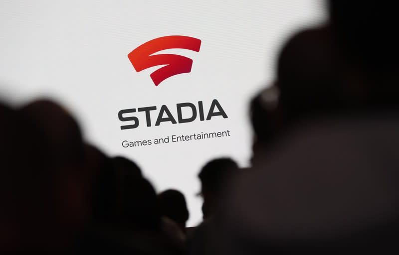 Spectators look on during a Google keynote address announcing a new video gaming streaming service named Stadia at the Gaming Developers Conference in San Francisco