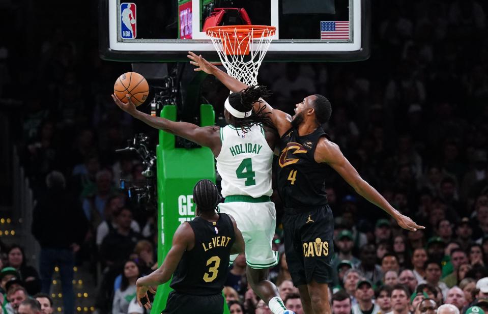 Cavaliers forward Evan Mobley defends Celtics guard Jrue Holiday in the first quarter during Game 2 of the Eastern Conference semifinals, May 9, 2024, in Boston.