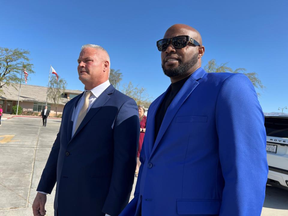 Chris Yingling, left, CEO of ABC Recovery Center in Indio, is joined by Deonte Clayton, who spent more than a year living at the facility and now works there as a behavioral health technician. They were touring the facility with California Gov. Gavin Newsom on March 1, 2024.