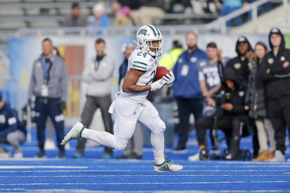 Ohio running back De'Montre Tuggle (24) runs the ball against Nevade in the first half of the Famous Idaho Potato Bowl NCAA college football game Friday, Jan. 3, 2020, in Boise, Idaho. (AP Photo/Steve Conner)