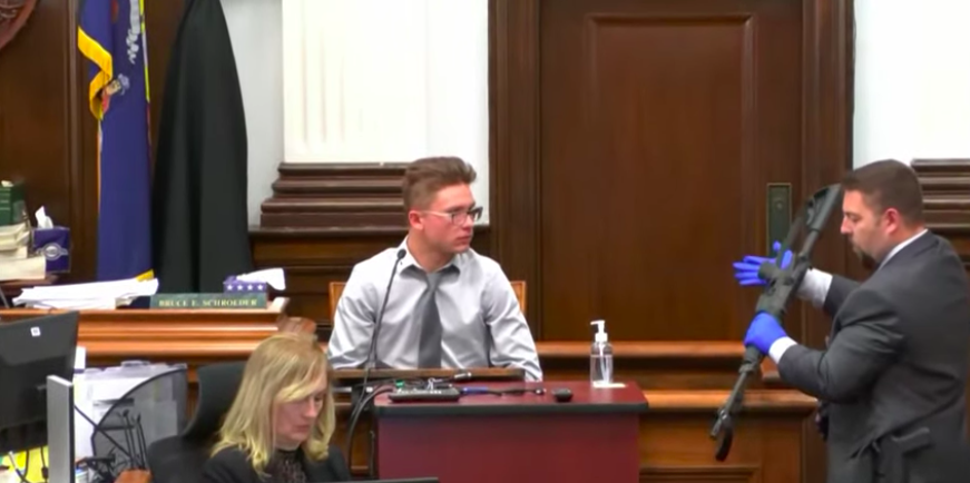 Dominick Black, a friend of Kyle Rittenhouse who accompanied him to Kenosha, is shown Rittenhouse's rifle during testimony. Black was the first witness to testify in Rittenhouse's trial.