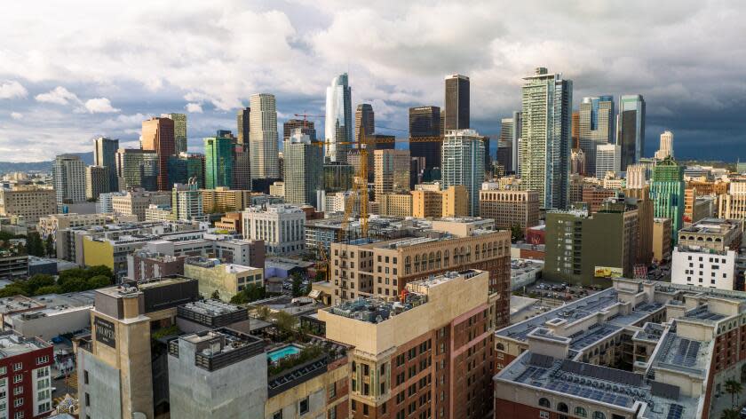 Los Angeles , CA - May 04 A view of the Cara Cara Rooftop Bar, long and dining area showing a view of the Los Angeles Downtown City Skyline. (Brian van der Brug / Los Angeles Times)