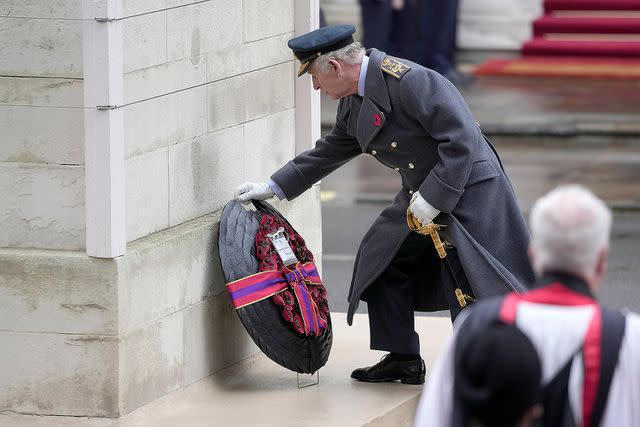 <p>Kin Cheung - WPA Pool/Getty</p> King Charles lays his wreath at the Cenotaph in Central London on Sunday