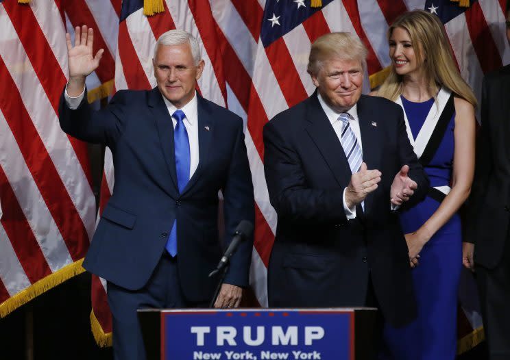 Donald Trump applauds after introducing Indiana Gov. Mike Pence as his vice presidential running mate. (Photo: Carlo Allegri/Reuters)