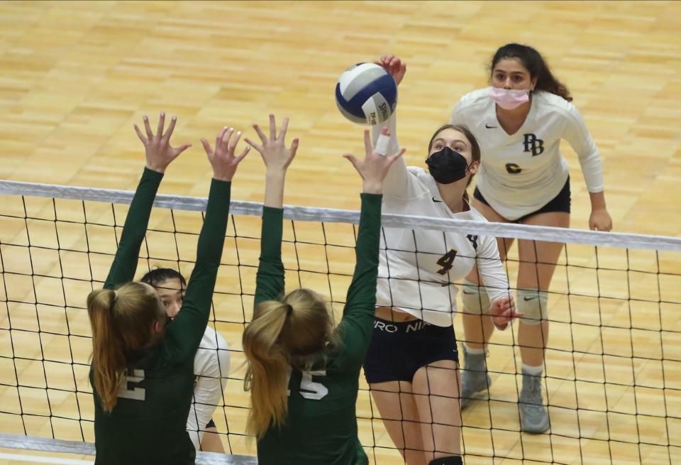 Pine Bush's Monica Ilioiu (4) with a spike during the opening round of pool play in the NYSPHSAA girls volleyball championships at Cool Insuring Arena in Glens Falls on Saturday, November 20, 2021.