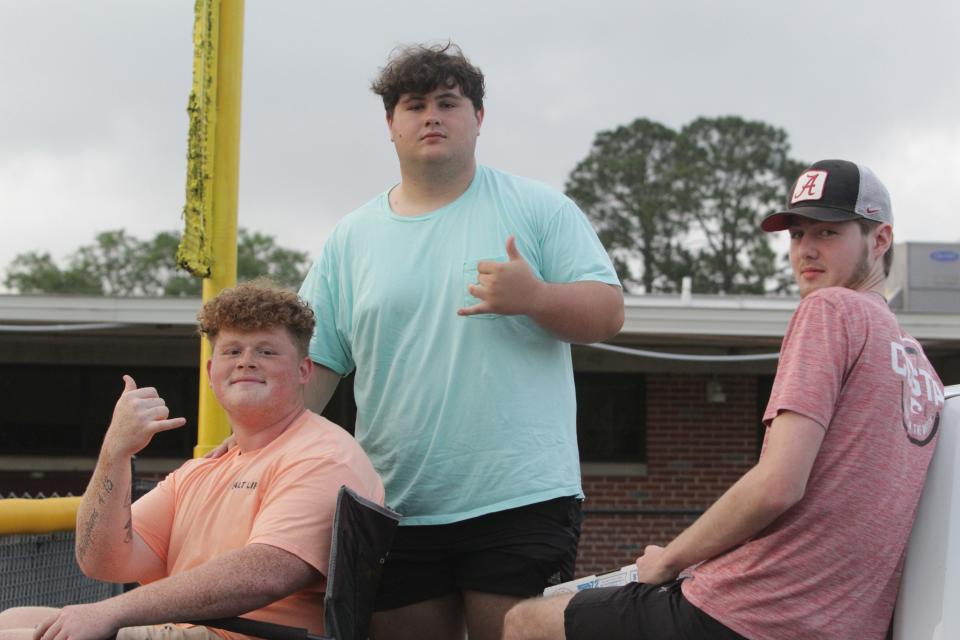 Pensacola Catholic students take in a baseball game as part of the school's student section, the "Left Field Lounge," during the Crusaders' home game against Keystone Heights on Wednesday, May 8, 2024.