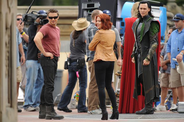 <p>Kristin Callahan/Shutterstock </p> Jeremy Renner, Scarlett Johansson and Tom Hiddleston filming 'The Avengers' on Sept. 2, 2011
