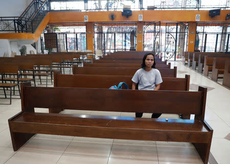 Kathrina Polo is pictured inside a church in Barangay Payatas district in Quezon City, Metro Manila in the Philippines December 11, 2017. REUTERS/Erik De Castro