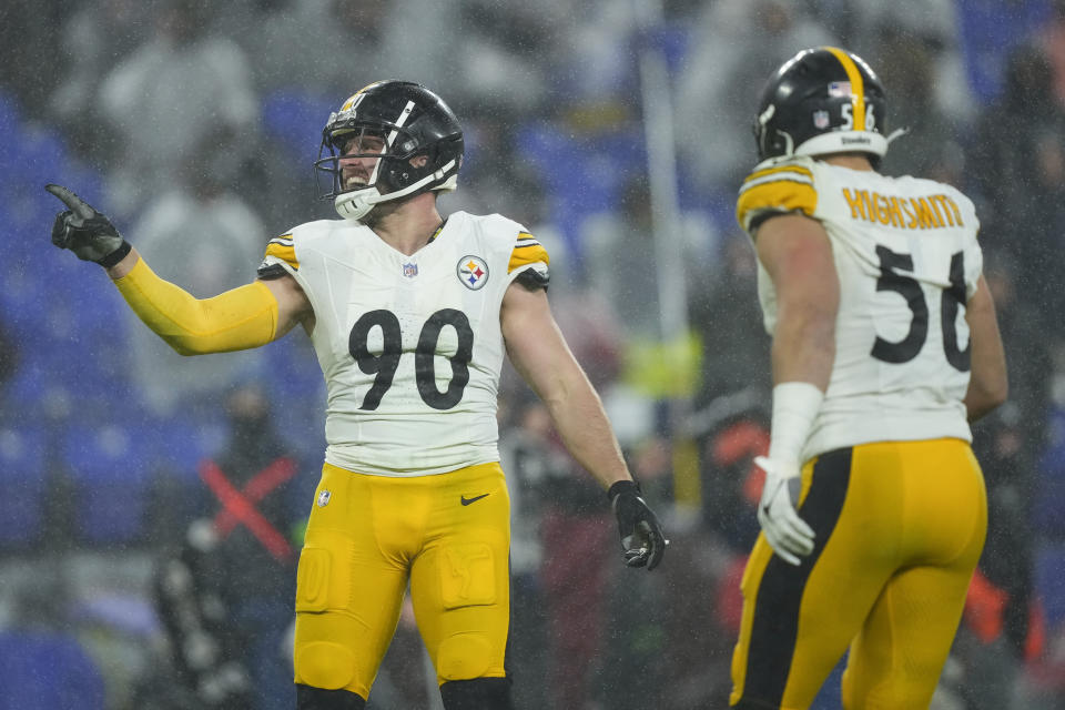 Pittsburgh Steelers linebacker T.J. Watt (90) reacts near teammate linebacker Alex Highsmith (56) after sacking Baltimore Ravens quarterback Tyler Huntley during the second half of an NFL football game, Saturday, Jan. 6, 2024 in Baltimore. (AP Photo/Matt Rourke)