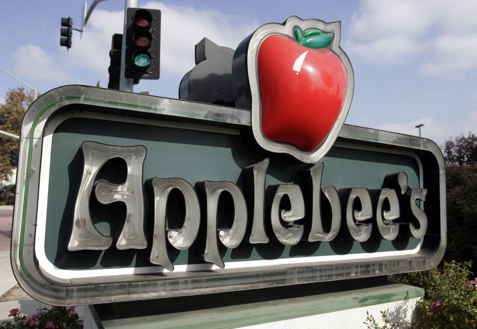 Exterior of an Applebee's sign near their restaurant in Milpitas, Calif., Tuesday, Oct. 30, 2007. Shareholders of the bar-and-grill chain Applebee's International Inc. on Tuesday approved a $1.9 billion buyout offer from pancake house operator IHOP Corp. (AP Photo/Paul Sakuma)