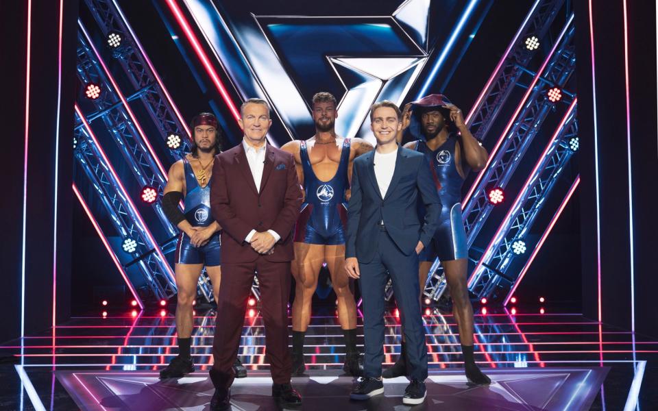 Presenters Bradley and Barney Walsh with the Gladiators, the elite athletes contenders must take on in the reboot of much-loved TV show Gladiators