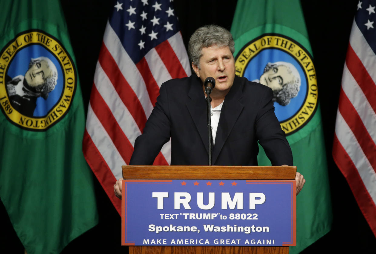 Mike Leach head football coach at Washington State University, speaks in support of Republican presidential candidate Donald Trump during a rally in Spokane, Wash., Saturday, May 7, 2016. (AP Photo/Ted S. Warren)