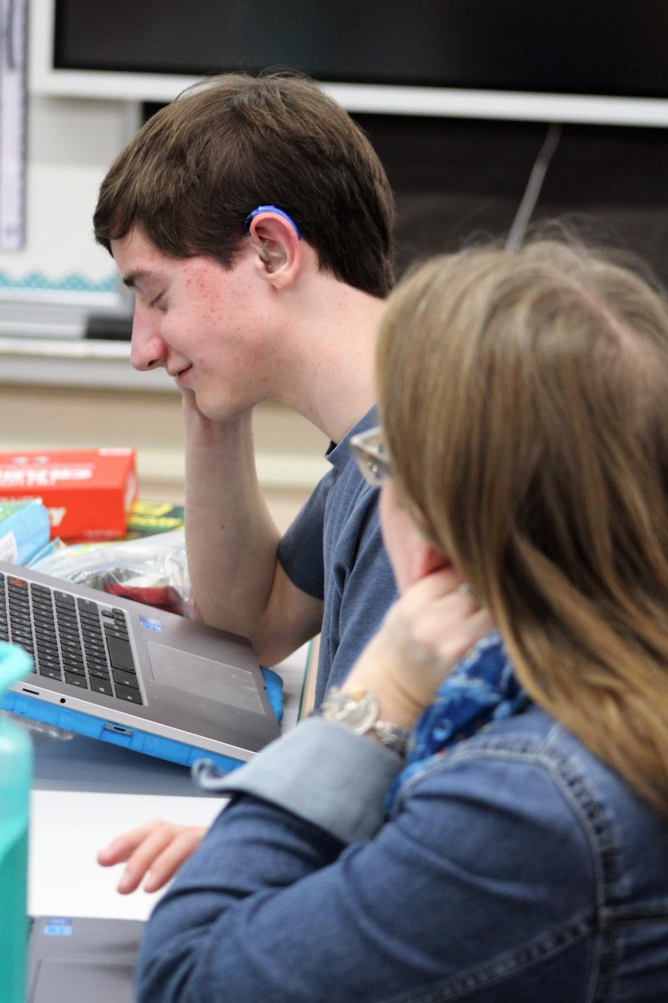 MSDB teacher Denise Rutledge works with Samsung STEM team student Levi Wahl during a morning class.