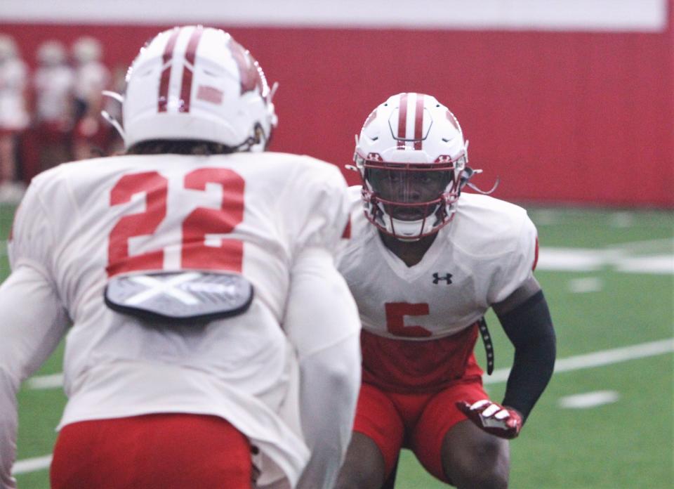 Wisconsin defensive back RJ Delancy (5) covers Jace Arnold during a drill in spring practice at the McClain Center in Madison, Wisconsin on Tuesday April 16, 2024.
