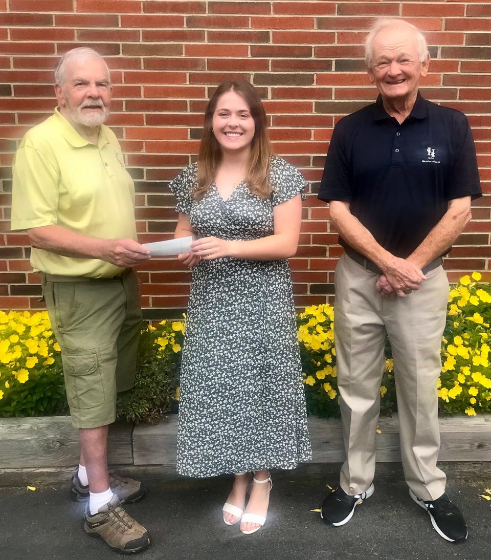 Maya Pagano of Wallenpaupack Area (center) has been awarded a $500 scholarship from the Cricket Hill Men's Golf League. On hand to present the check were Lynn Simons (left) and Buckhorn Head Coach Bob Simons (right).