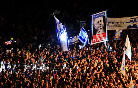 Israelis take part in a demonstration calling for lower living costs and social justice in Tel Aviv September 3, 2011. REUTERS/Ronen Zvulun/File Photo