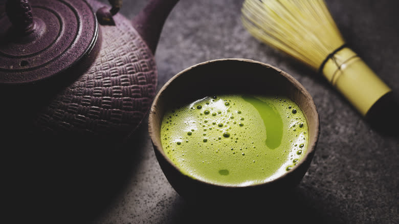 Green tea in clear mug