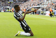 Newcastle United's Alexander Isak celebrates scoring his side's first goal during the English Premier League soccer match between Newcastle United and West Ham at St. James' Park, Newcastle upon Tyne, England, Saturday March 30, 2024. (Richard Sellers/PA via AP)