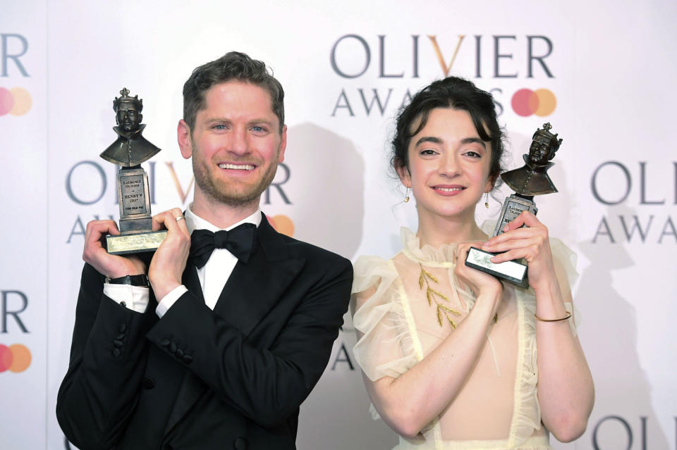 Kyle Soller with the Best Actor award and Patsy Ferran with the Best Actress award, at the Olivier Awards ceremony in London, Sunday April 7, 2019. Spanish-British actress Patsy Ferran was crowned best actress for her performance in "Summer and Smoke" as a woman consumed by love, and Kyle Soller is awarded for his work in "The Inheritance," an epic but intimate story of modern gay lives. (Ian West/PA via AP)