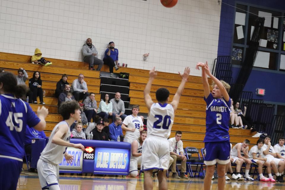 Narragansett's Max Kauffman (No. 2) releases a 3-point shot against Murdock on Friday, Dec. 29, 2023.