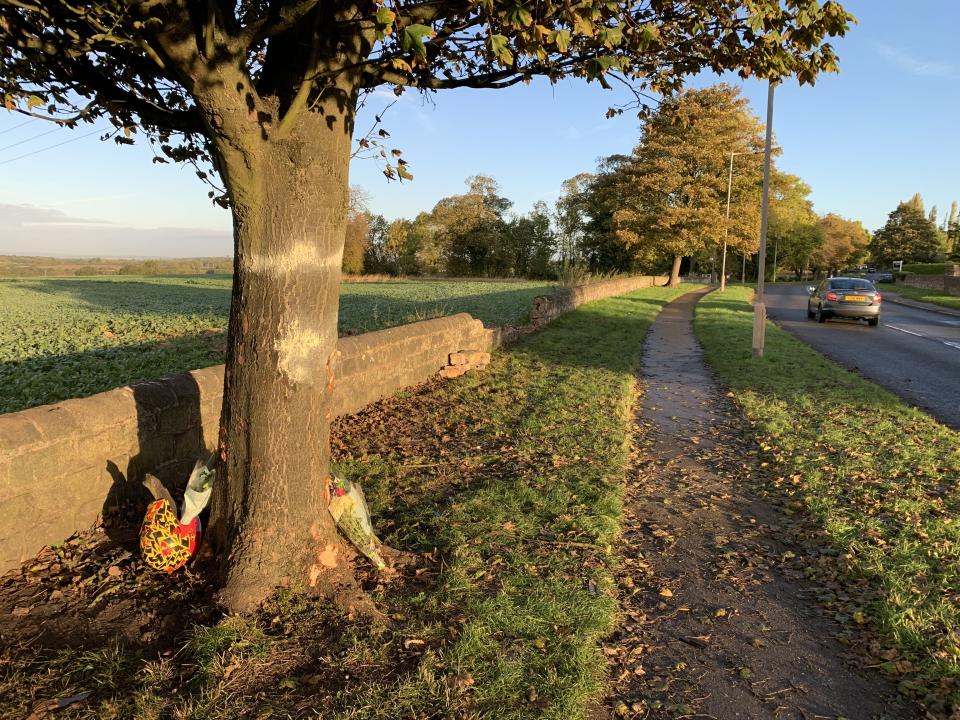 The scene in Rotherham where three teenagers died in a car crash after a vehicle came off the road and struck a tree. Picture date: Monday October 25, 2021.