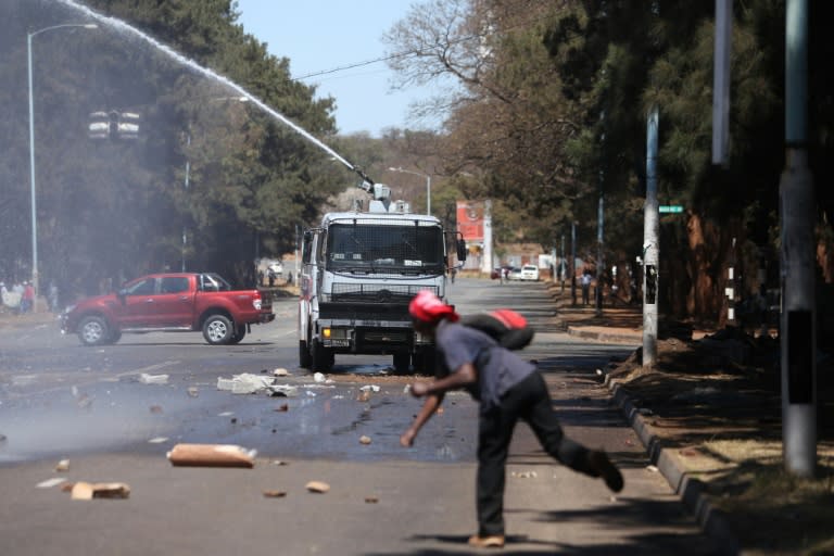 Zimbabwe's President Robert Mugabe accused foreign powers of having a hand in the unrest which saw opposition supporters clash with police in Harare