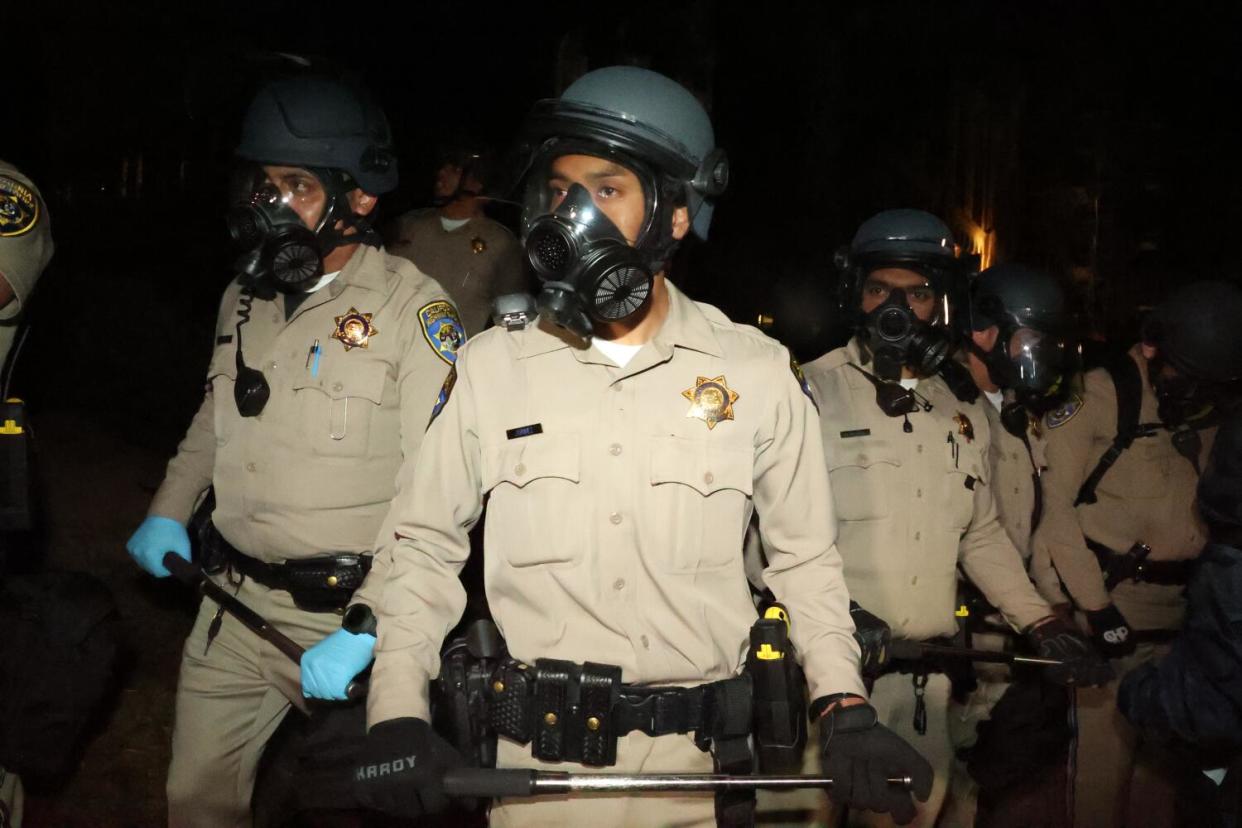 California Highway Patrol officers standing guard