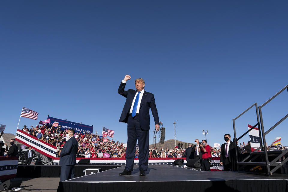 President Donald Trump arrives to speak at a campaign rally at Carson City Airport, Sunday, Oct. 18, 2020, in Carson City, Nev. (AP Photo/Alex Brandon)