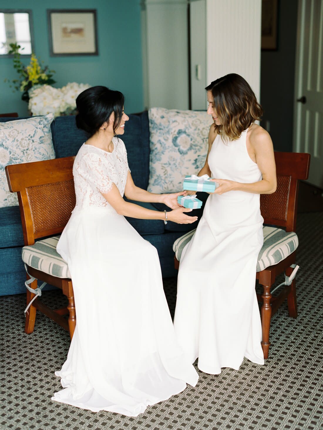 brides exchanging Tiffany Co. wedding gifts