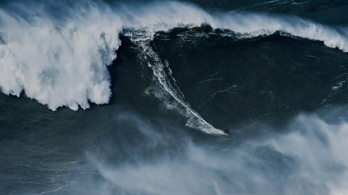 Sebastian Steudtner with the 93.73-foot, and potential new world record, wave.<p>Photo: Porsche</p>