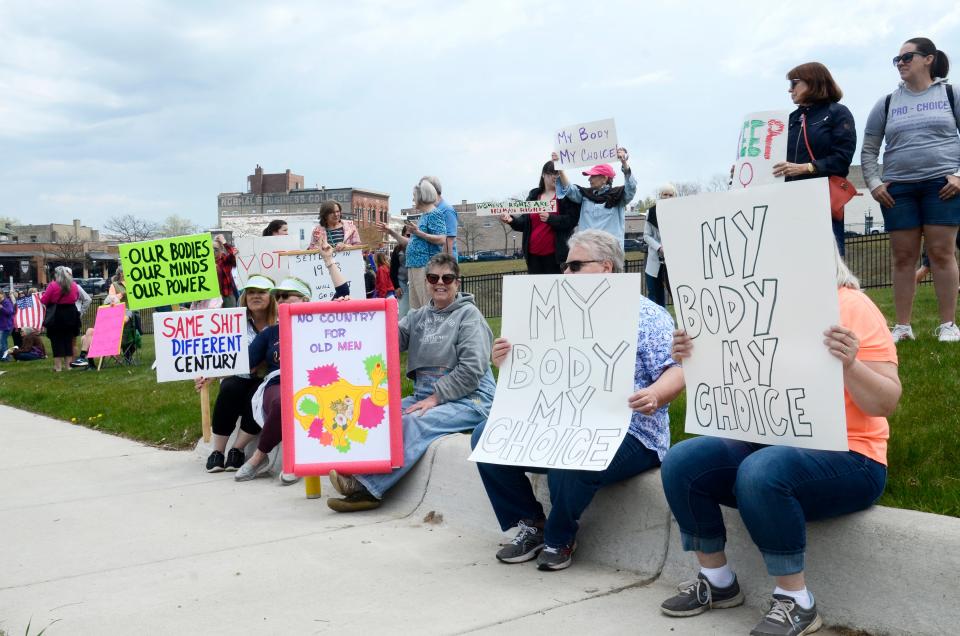 More than 120 people stood in front of 200 E. Lake St., a popular protest spot in downtown Petoskey, with signs showing their support for the pro-choice movement and abortion access on May 14.