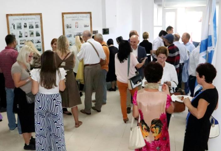 Visitors attend the opening ceremony of the renovated Solomon Jewish history museum in the Albanian city of Berat, on September 29, 2019.Albania's sole Jewish history museum reopened in southern Berat on September 29, thanks to a businessman who rescued it from the brink of closure. The small "Solomon Museum", which tells the story of how Muslim and Christian Albanians sheltered hundreds of Jews during the Holocaust, was the passion project of a local professor, Simon Vrusho. (AFP Photo/STRINGER)