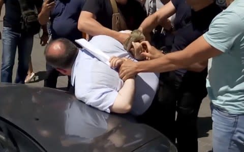 Russia arrest - Credit: AFP/YOUTUBE/UKRAINE SECURITY SERVICE