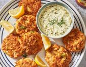 <p>Crab cakes are the ideal dish to cook in the air fryer because you want that crispy texture all around without ending up with an oil-logged cake. </p><p>Get the <a href="http://www.delish.com/uk/cooking/recipes/a38409648/air-fryer-crab-cakes-recipe/" rel="nofollow noopener" target="_blank" data-ylk="slk:Air Fryer Crab Cakes;elm:context_link;itc:0;sec:content-canvas" class="link ">Air Fryer Crab Cakes</a> recipe.</p>