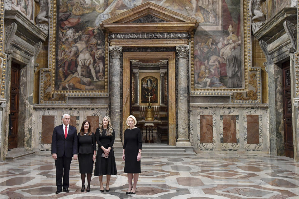 From left; US Vice President Mike Pence, his wife Karen, their daughter-in-law Sarah Pence and US Ambassador to the Holy See Callista Gingrich, pose for a photo during their private tour of the Vatican after his private audience with Pope Francis, at the Vatican, Friday, Jan. 24, 2020. The pontiff and the vice president had a private hour-long conservation. (Alessandro Di Meo/Pool Photo via AP)