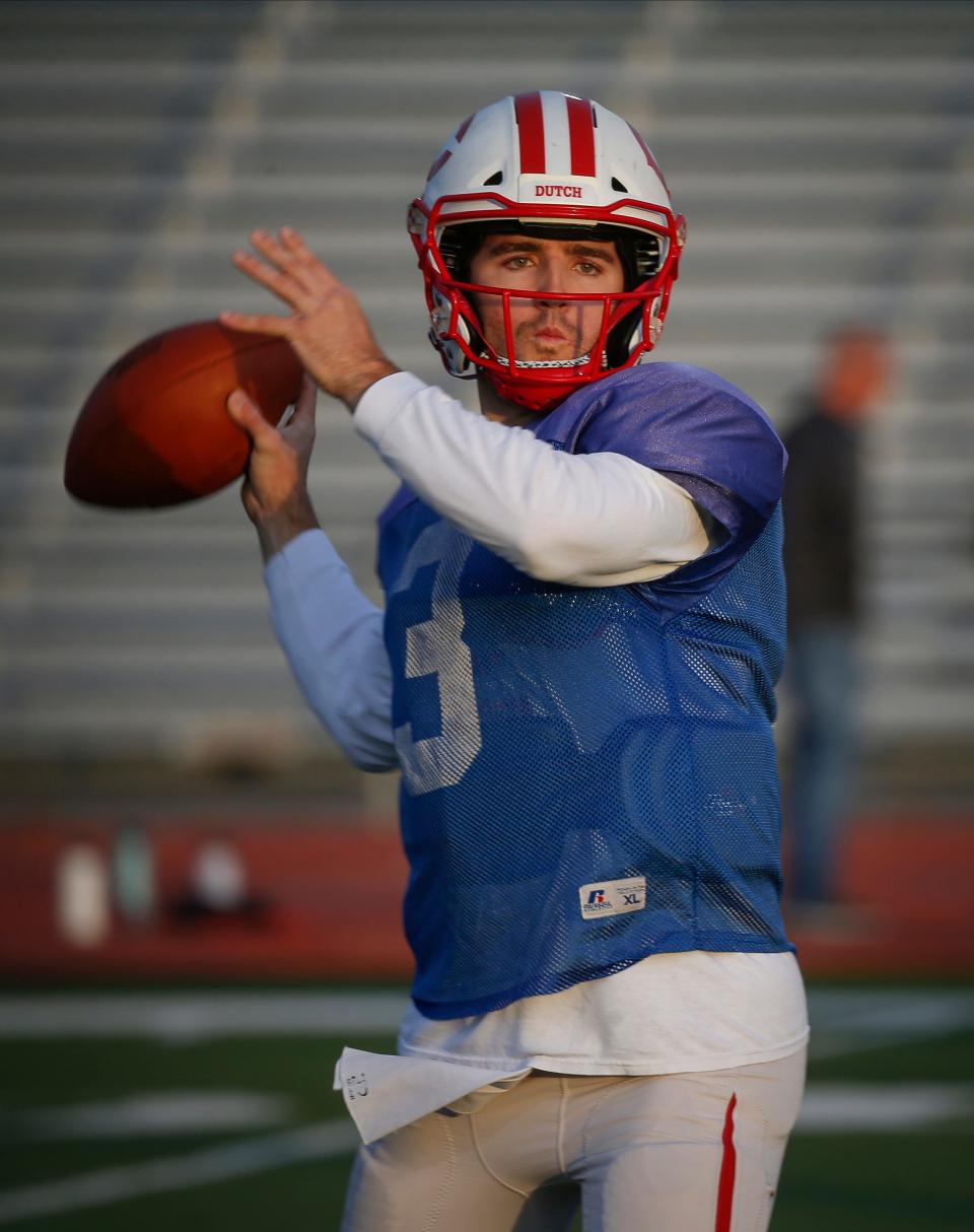 Central College quarterback Blaine Hawkins throws a pass during practice on Tuesday, Nov. 16, 2021, in Pella. Hawkins, who is back this season after missing last year due to the COVID-19 pandemic, is having one of the best seasons of any quarterback in the nation at any level. 