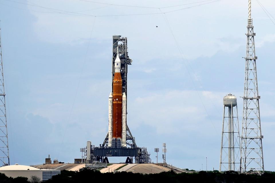 The NASA moon rocket stands ready less than 24 hours before it is scheduled to launch on Pad 39B for the Artemis 1 mission to orbit the moon at the Kennedy Space Center, Sunday, Aug. 28, 2022, in Cape Canaveral, Florida.