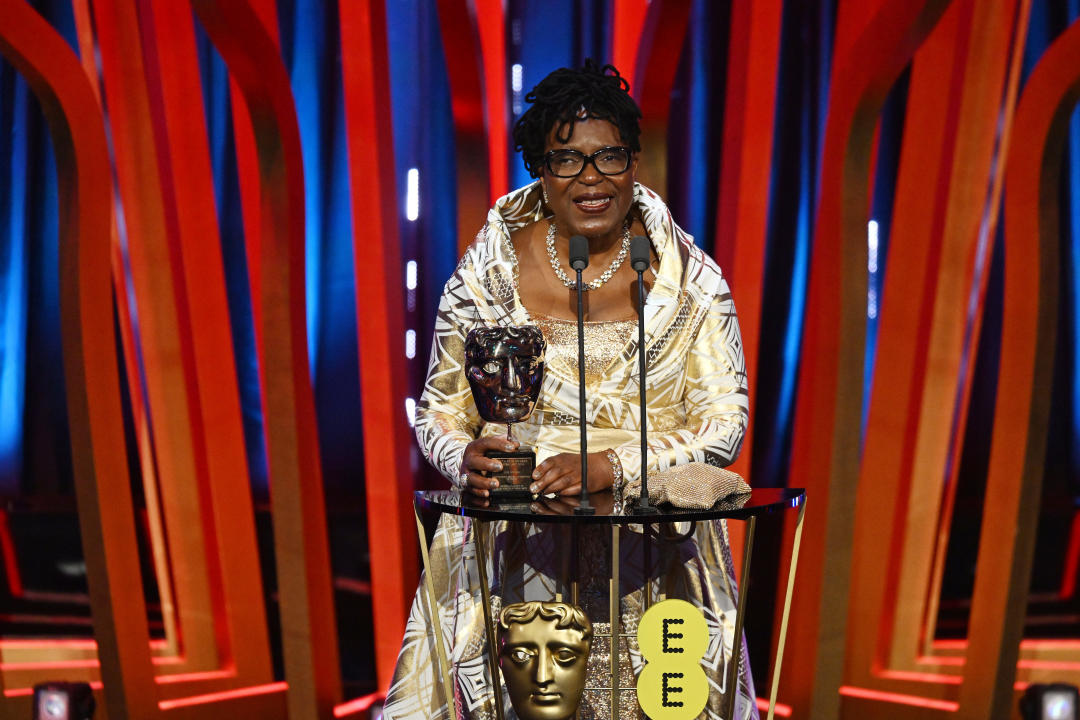 LONDON, ENGLAND - FEBRUARY 18: June Givanni accepts the Outstanding British Contribution to Cinema Award during the 2024 EE BAFTA Film Awards, held at the Royal Festival Hall on February 18, 2024 in London, England. (Photo by Kate Green/BAFTA/Getty Images for BAFTA)