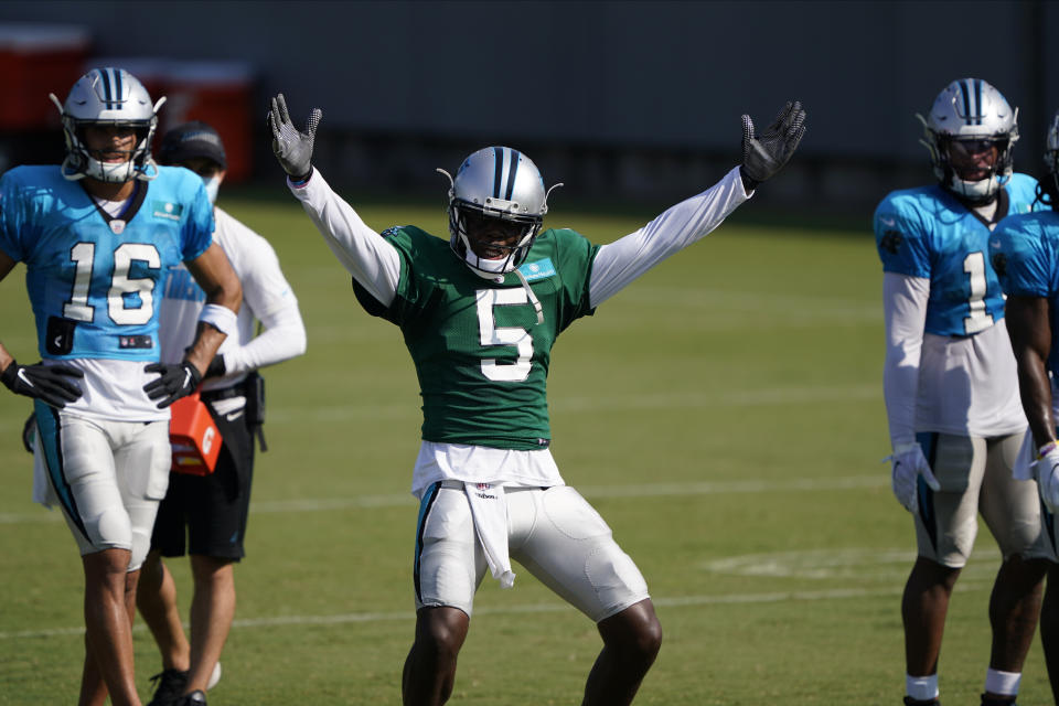 Carolina Panthers quarterback Teddy Bridgewater, center, has reason to celebrate four. years after his devastating knee injury. (AP Photo/Chris Carlson