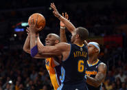 LOS ANGELES, CA - MAY 12: Kobe Bryant #24 of the Los Angeles Lakers goes up for a shot over Arron Afflalo #6 of the Denver Nuggets in the first half in Game Seven of the Western Conference Quarterfinals in the 2012 NBA Playoffs on May 12, 2012 at Staples Center in Los Angeles, California. NOTE TO USER: User expressly acknowledges and agrees that, by downloading and or using this photograph, User is consenting to the terms and conditions of the Getty Images License Agreement. (Photo by Harry How/Getty Images)