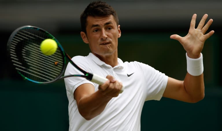 Australia's Bernard Tomic, on July 3, 2015, is facing resisting arrest charges after Miami Beach police say he refused to turn down the music at a hotel penthouse party