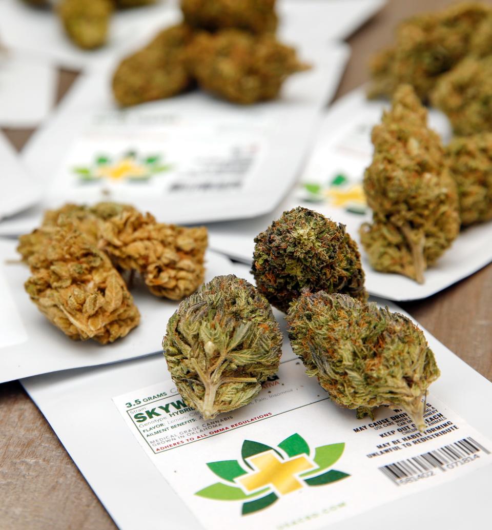 Cannabis flowers, along with their packaging, are pictured Dec. 3, 2018, at CBD Plus USA, 420 N Pennsylvania, in Oklahoma City.