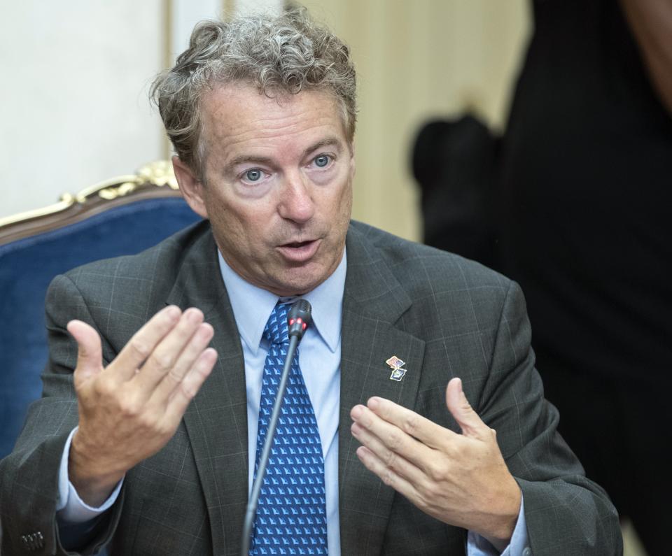 Sen. Rand Paul speaks during his meeting with Russian lawmakers in Moscow, Russia, Monday, Aug. 6, 2018. Paul said he invited Russian lawmakers to visit the United States to help foster inter-parliamentary contacts. (AP Photo/Pavel Golovkin)