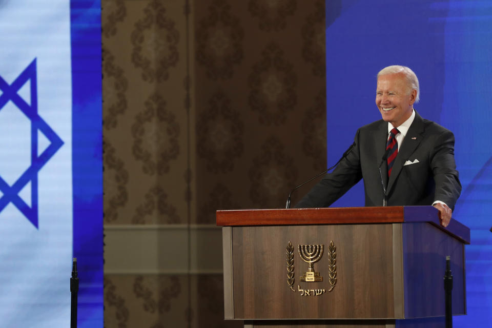 U.S. President Joe Biden speaks at a press conference with Israeli Prime Minister Yair Lapid, at the Waldorf Astoria Hotel in Jerusalem, Thursday, July 14, 2022. (Atef Safadi/Pool via AP)