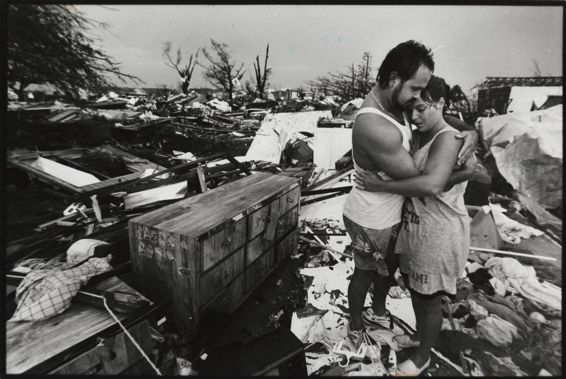 Vivian and Lazaro Hernandez embraced after finding some salvageable memories, like wedding photos in the remains of what was their home, after Hurricane Andrew hit South Miami-Dade on Aug. 24, 1992.
