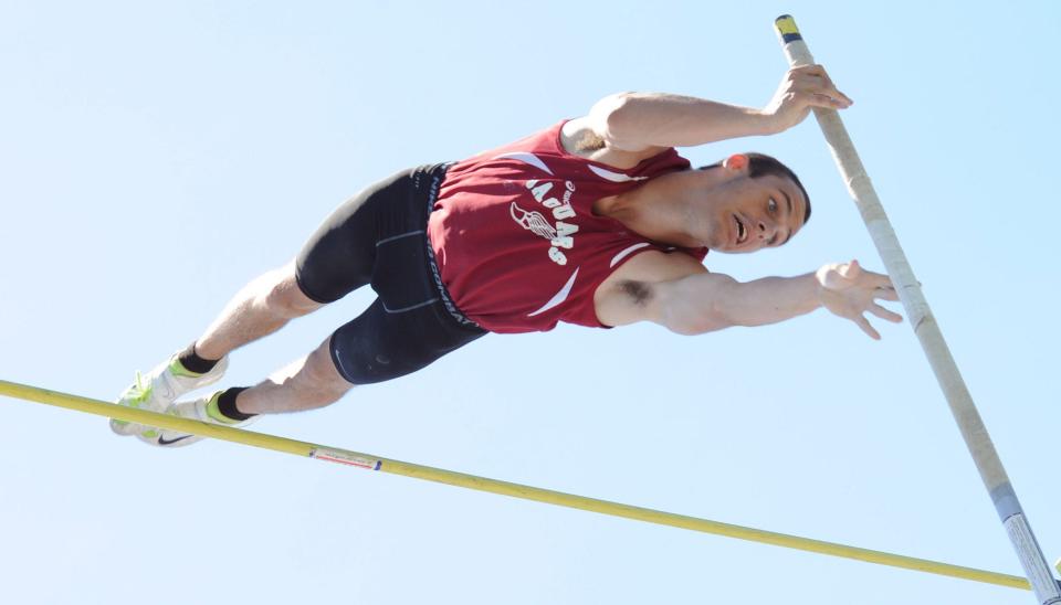 Michael Jensen of Appoquiniink clearing 16 feet and setting a new state meet record in 2012.