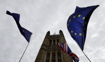 A European Union flag flies near Parliament in London, Tuesday, Oct. 8, 2019. The British government said Tuesday that the chances of a Brexit deal with the European Union were fading fast, as the two sides remained unwilling to shift from their entrenched positions. (AP Photo/Kirsty Wigglesworth)